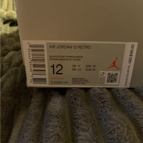 Air Jordan 13 Retro
Men's Shoes
Black/White/Court Purple
Size 12 - Picture 2 of 5